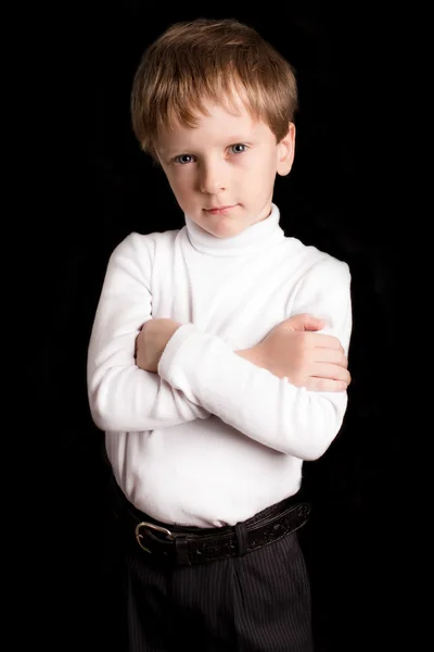 Retrato del niño sobre un fondo negro — Foto de Stock