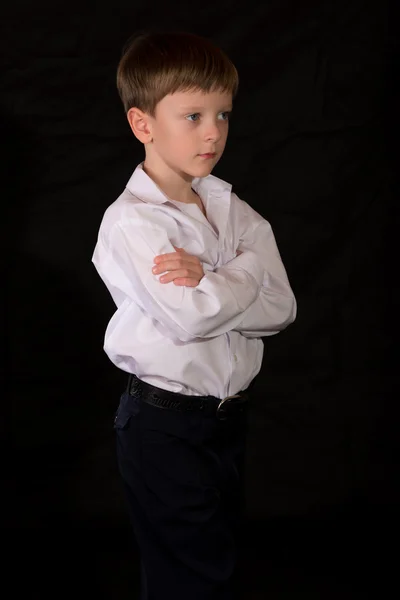 Portrait of the boy on a black background — Stock Photo, Image