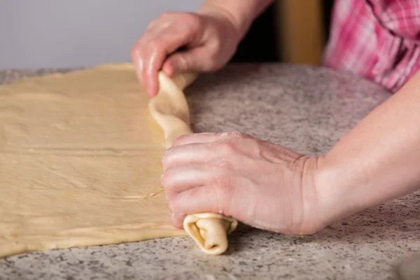 Housewife cooking dough — Stock Photo, Image