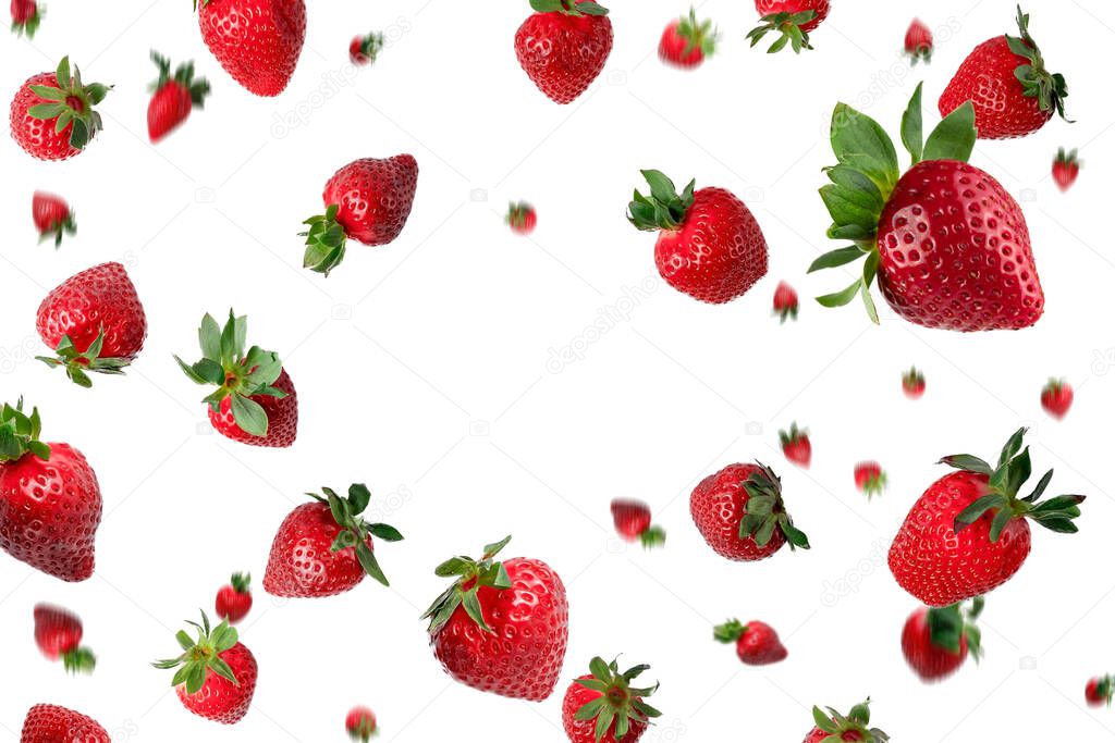 many red fresh whole strawberries falling down above a white background with copy space