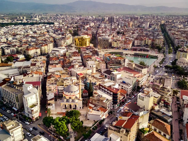 Aerial photograph of the capital of Aydin province - Aydin city from high point of drone fly in sunny day in Turkey. Amazing aerial cityscape view from birds fly altitude on beautiful city centre and parks.