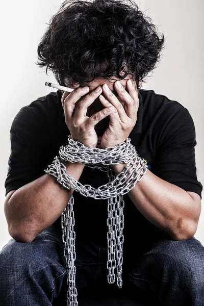 Drugs Man fists in strained chains — Stock Photo, Image