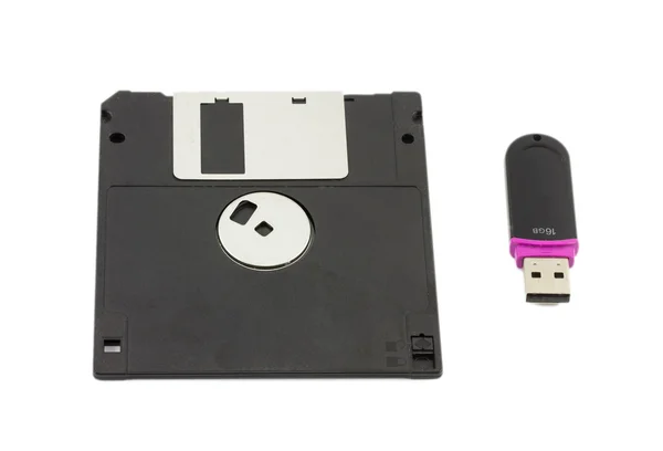 Flash drive and floppy disk isolated on white background — Stock Photo, Image