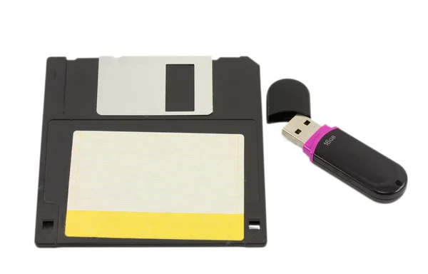 Flash drive and floppy disk isolated on white background — Stock Photo, Image