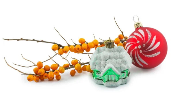 Christmas ornaments and branch of sea-buckthorn berries isolated — Stock Photo, Image