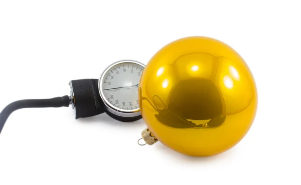 Tonometer and Christmas ball isolated on a white background — Stock Photo, Image