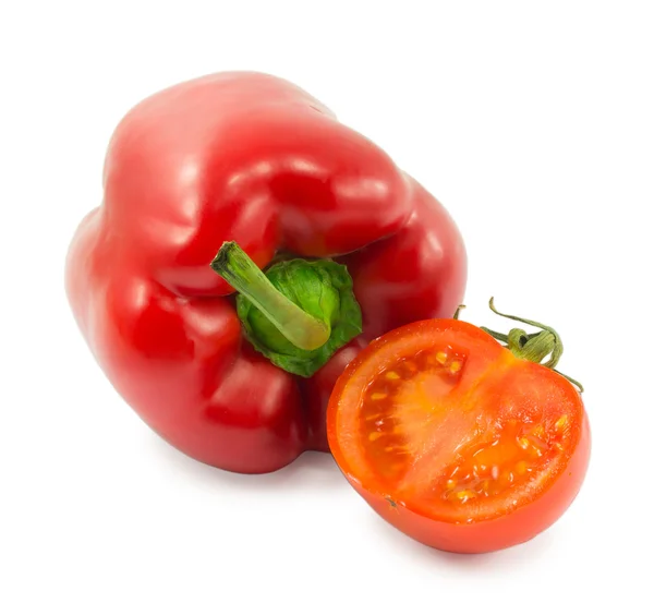 Red bell pepper and tomato isolated on white background Stock Picture