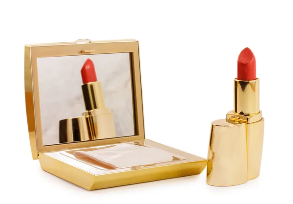 Gold lipstick and powder isolated on white background — Stock Photo, Image