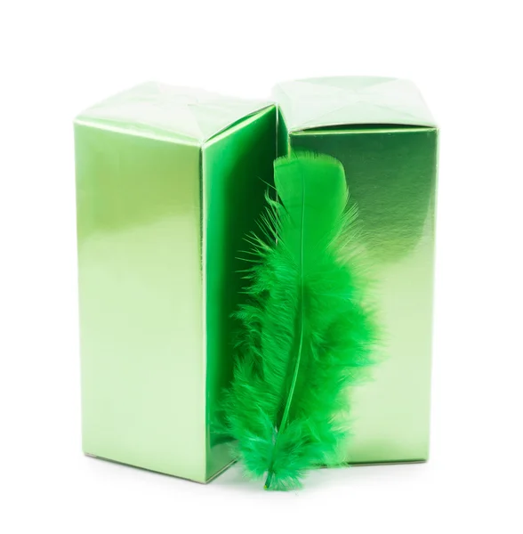 Green box with perfume and feather isolated on white background — Stock Photo, Image