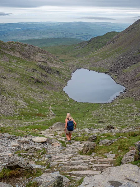 Female Hill Walker Descending Goats Water English Lake District Footpath — Stock Photo, Image