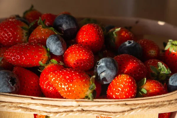 Strawberries Blueberries Raspberries Wooden Tray Light Background — Stock Photo, Image
