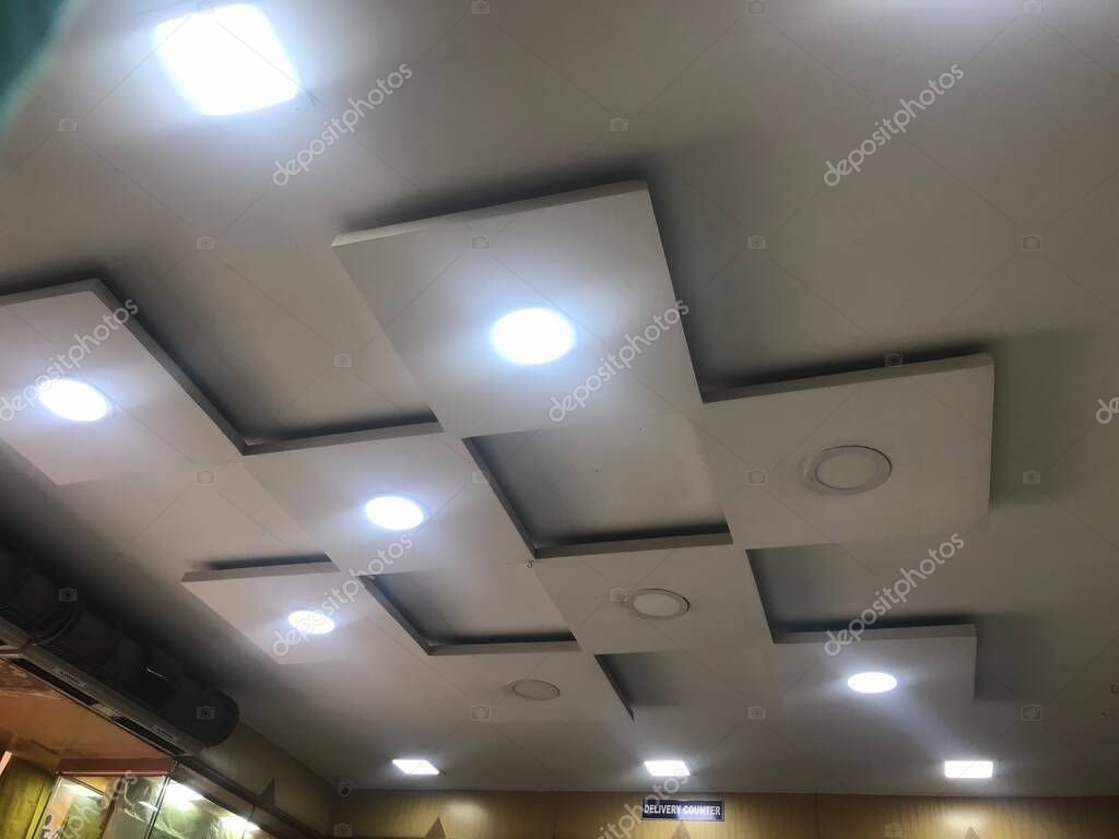 Suspended Gypsum Reflected False Ceiling Design Or Designs Made At Corner Of Large Area Decoration For An Commercial Shopping Mall Larastock Suspended Gypsum Reflected False Ceiling Design Or Designs Made At Corner Of Large Area Decoration For An Commercial Shopping Mall Larastock