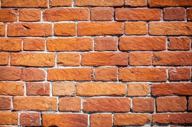 Eski kırmızı tuğla duvar. Tuğlalar sıra sıra dizildi. Grunge taş dokusu. Yüksek kalite fotoğraf