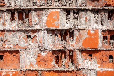 Eski kırmızı tuğla duvar. Tuğlalar sıra sıra dizildi. Grunge taş dokusu. Yüksek kalite fotoğraf
