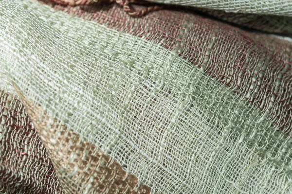 Texture of the fabric with a wide weave thread close up