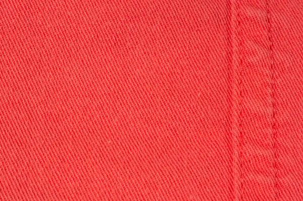 Denim of coral color close up. Textile background — Stock Photo, Image