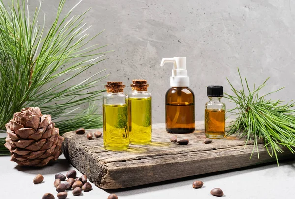 Composition Set Small Glass Bottles Essential Cedar Oil Old Wooden — Stock Photo, Image