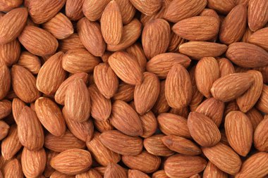 Soyulmuş bademleri kapatın, fındık arkaplan arkaplan görüntüsünü reklam için kullanın
