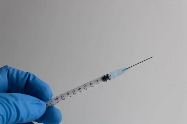 Needle Syringe Held Nurse Insulated Blue Glove White Background — Stock Photo, Image