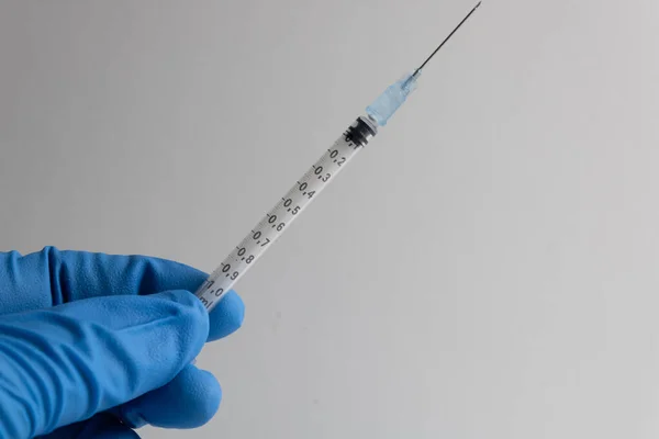 Syringe Needle Held Hand Protected Blue Insulated Glove White Background — Stock Photo, Image