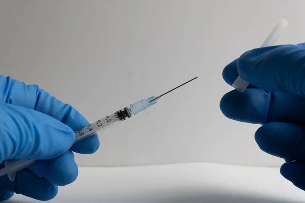 Nurse Blue Latex Gloves Uncovering Needle Syringe — Stock Photo, Image