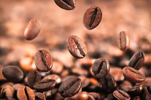 Flying coffee beans — Stock Photo, Image