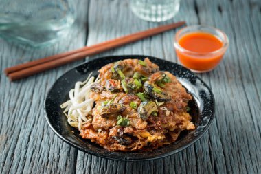 Kızarmış Asya yeşil midye omlet