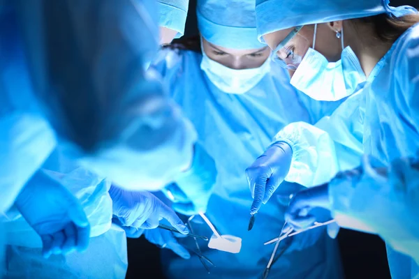 Team surgeon at work on operating in hospital — Stock Photo, Image