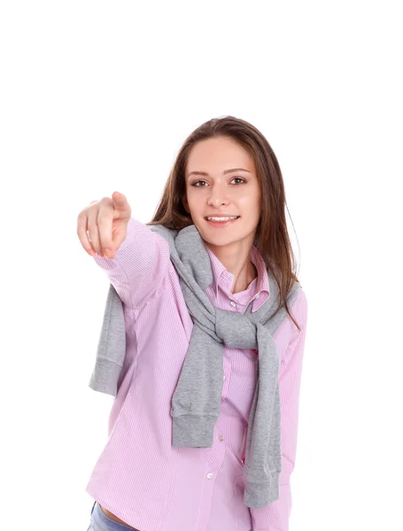 Junge Frau zeigt mit dem Finger auf weißen Hintergrund — Stockfoto