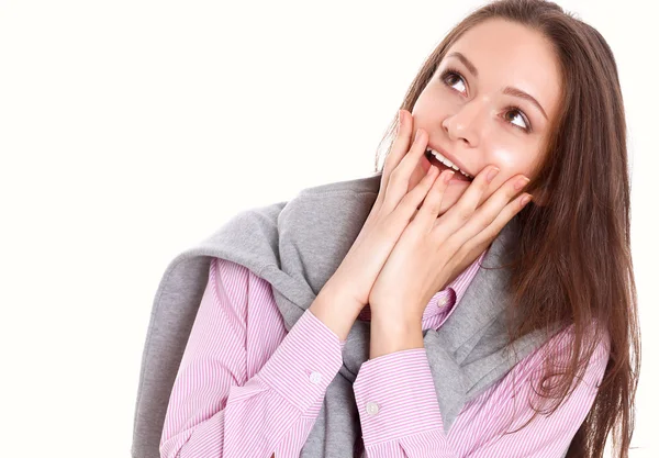 Mujer joven de pie sobre el fondo blanco — Foto de Stock