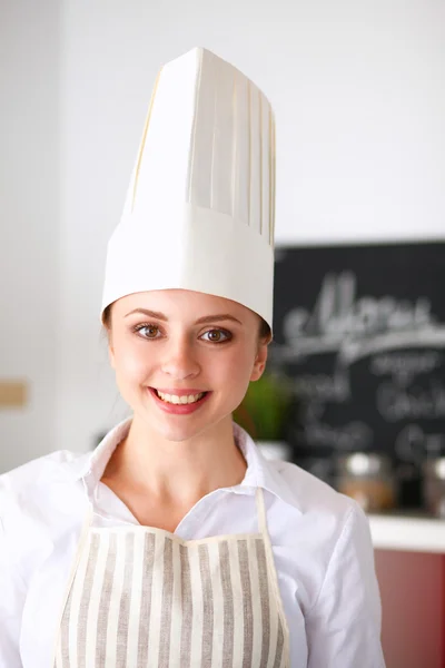 Chef vrouw portret met uniform in de keuken — Stockfoto