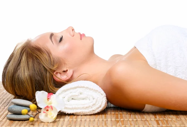 Closeup of an attractive young woman receiving massage — Stock Photo, Image