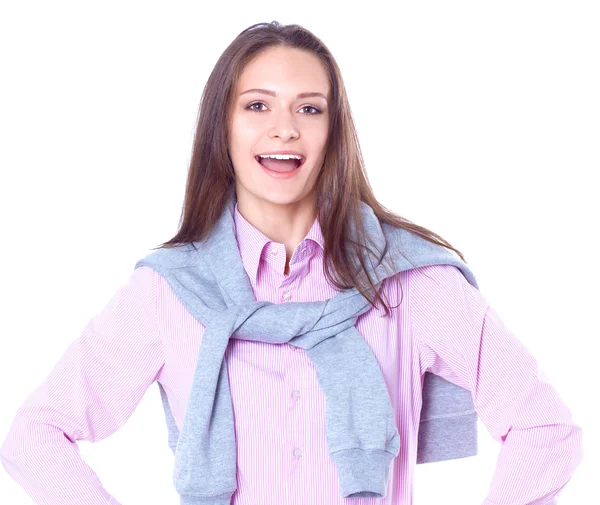 Mujer joven de pie sobre el fondo blanco — Foto de Stock