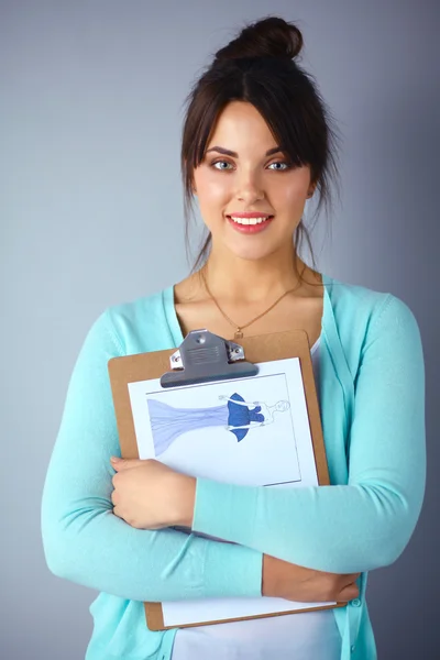 Woman with folder for documents on gray  background — Stock Photo, Image