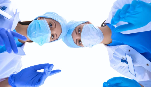 Surgeons team,  woman wearing protective uniforms,caps and masks — Stock Photo, Image