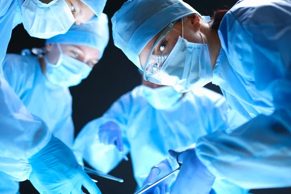 Team surgeon at work on operating in hospital — Stock Photo, Image