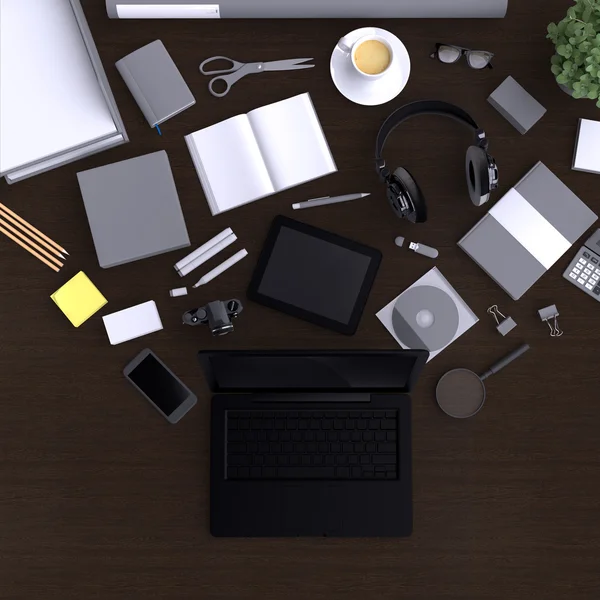 Laptop com variedade de objetos de escritório em branco . — Fotografia de Stock