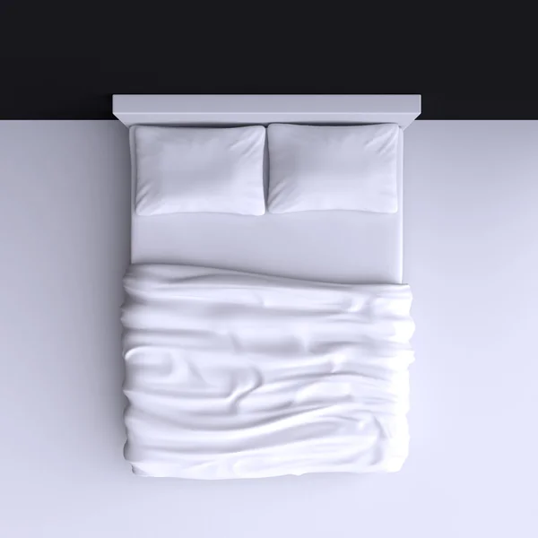 Cama con almohadas y manta — Foto de Stock