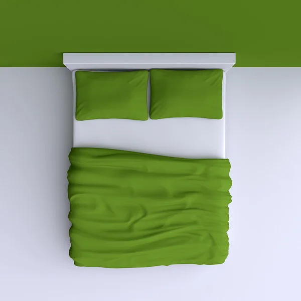 Łóżko z poduszki i koc — Zdjęcie stockowe