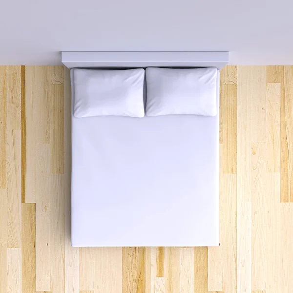 Cama com travesseiros e cobertor — Fotografia de Stock