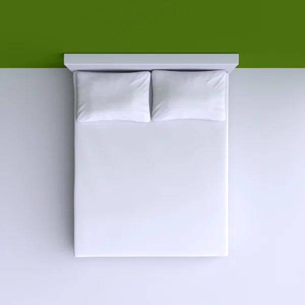 Cama con almohadas y manta — Foto de Stock