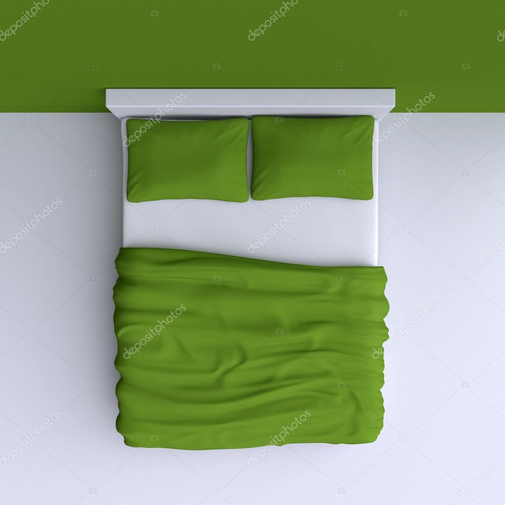 Bed with pillows and   blanket