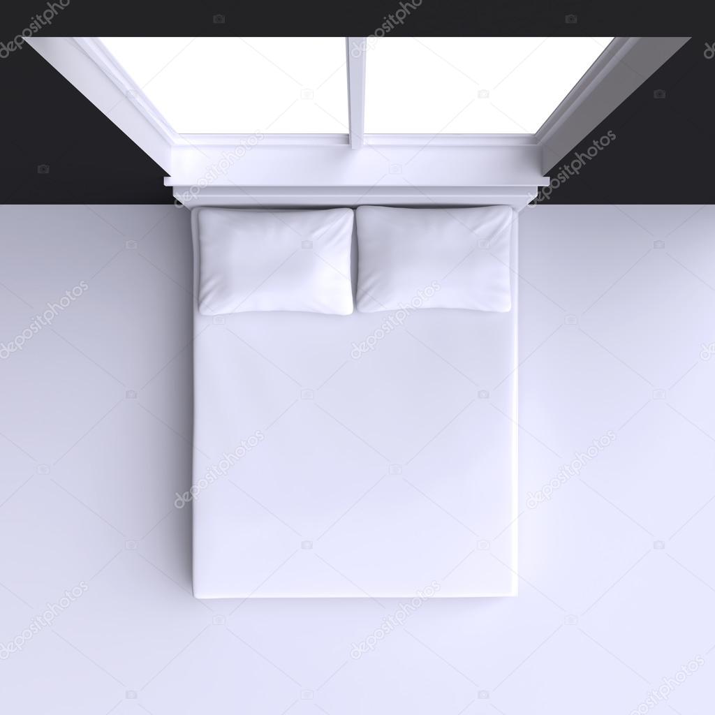 Bed with pillows  in room at window