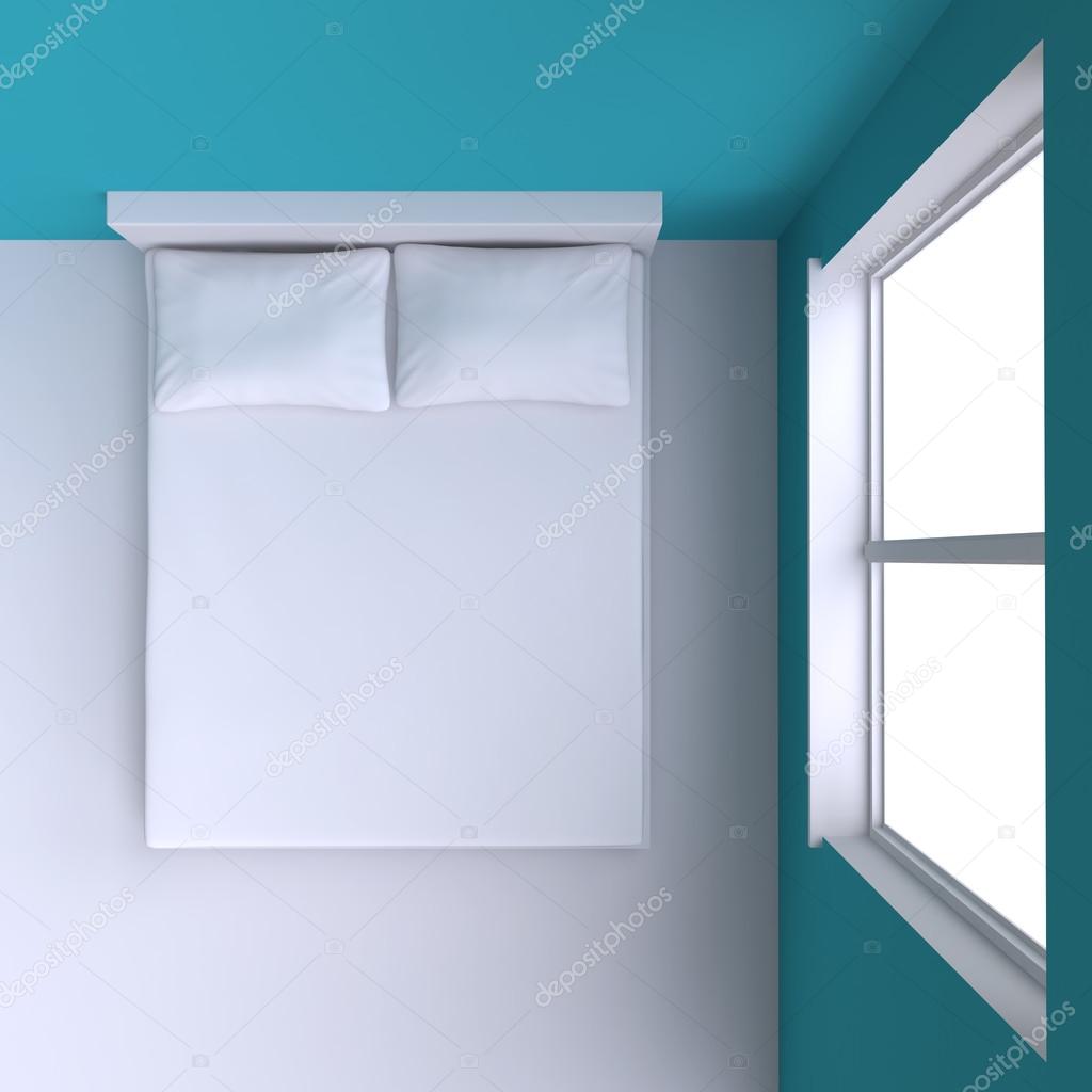 Bed with pillows  in room at window