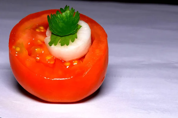 chopped tomato, radish and coriander leaves decorated on white paper, selective focus, symbol of indian tricolor, happy republic day, happy independence day