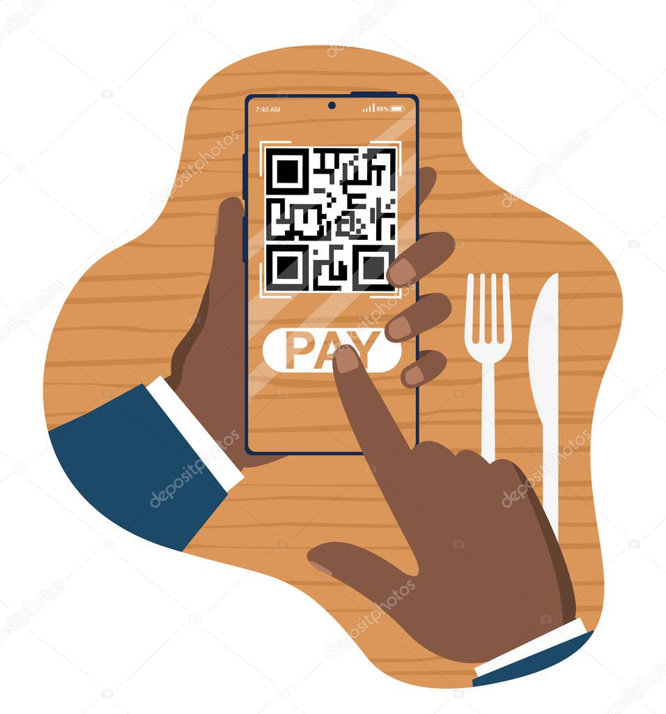 Hand holding smartphone with QR payment screen