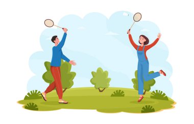 Şehir parkında güzel bir çift badminton oynuyor.