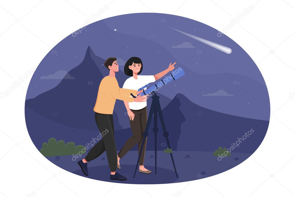 Happy cute couple are stargazing on a romantic night date