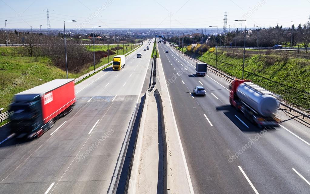 Highway transportation with cars and truck