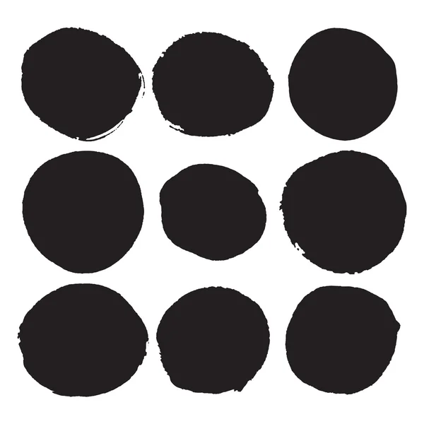 Set of black round ink stains. Grunge circles — Stock Vector